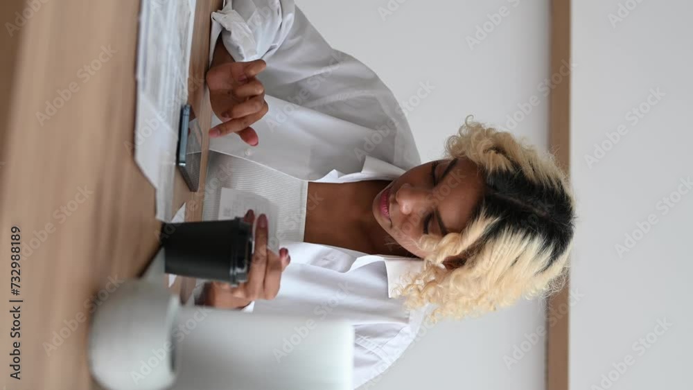 woman counting expenses on bills,credit cards, mortgage etc woman counting expenses on bills,credit cards, mortgage etc