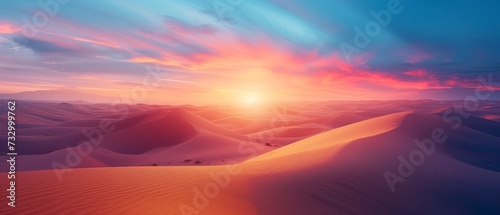 wide angle view of a desert  at vivid cloudy sunset sky. a desert landscape at twilight © ARTIFICIAN