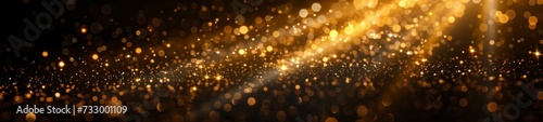 Golden glowing lights effects isolated on black background