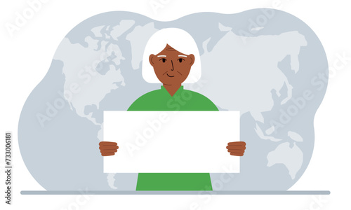 The concept of world attention. A woman holds a white poster in his hands against the background of a world map.
