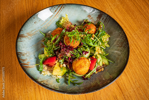 bowl with fish balls  and vegetables photo