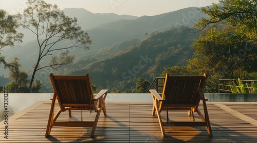 Serene morning scene with chairs arranged strategically to enjoy the breathtaking mountain panorama.
