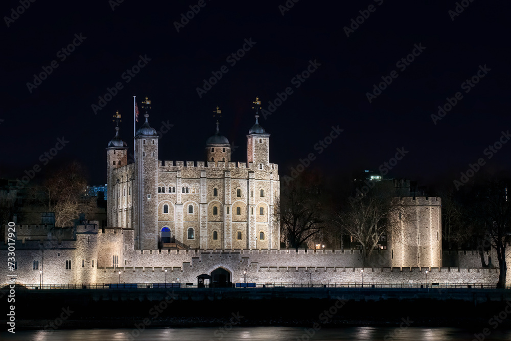 Tower of London by the River Thames in London, UK, Lit up at Night
