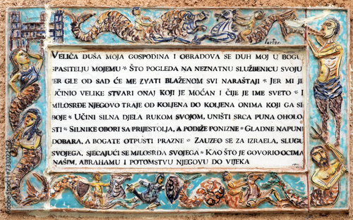 Colorful ceramic translations of the Magnificat into Croatian, a prayer sung by the Virgin Mary at this site, Church of the Pilgrimage in Ein Kerem, Israel photo