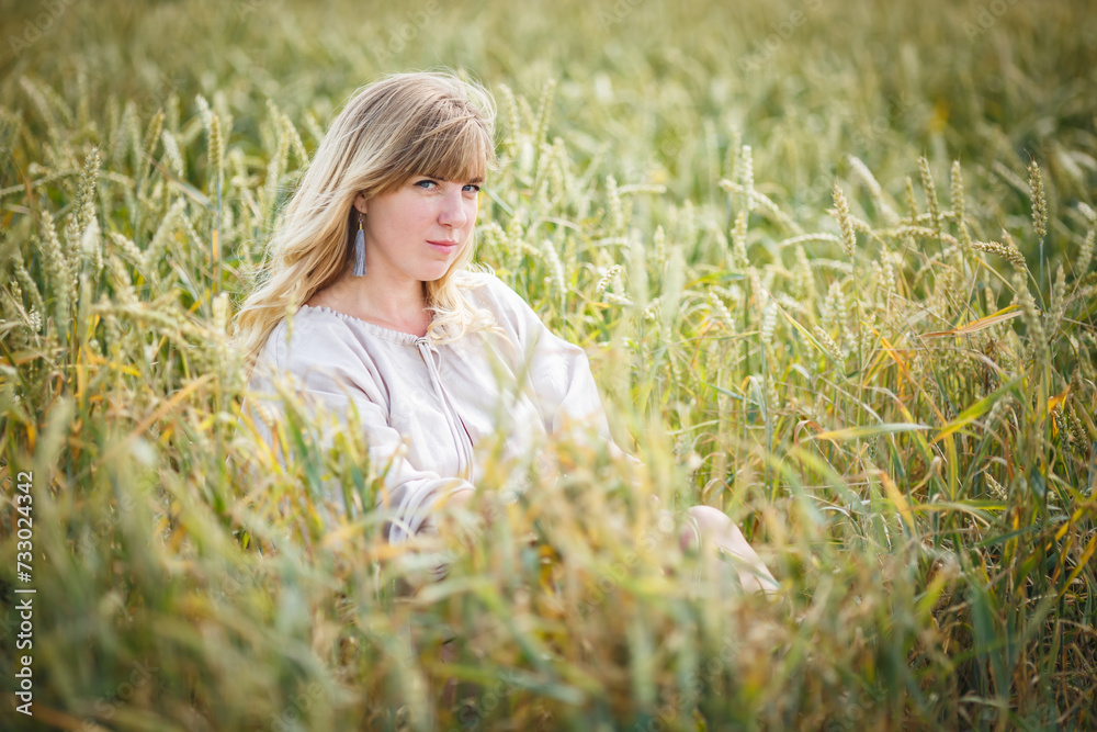 beautiful girl in a linen dress in a wheat field beautiful girl in a linen dress in a wheat field