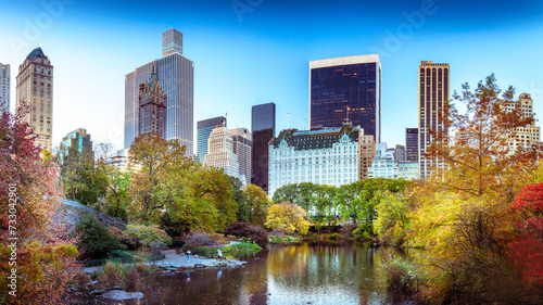Central Park in Manhattan, New York City in fall colors. In the autumn you can see the beautiful colors of the leaves turning red, yellow and brown. 