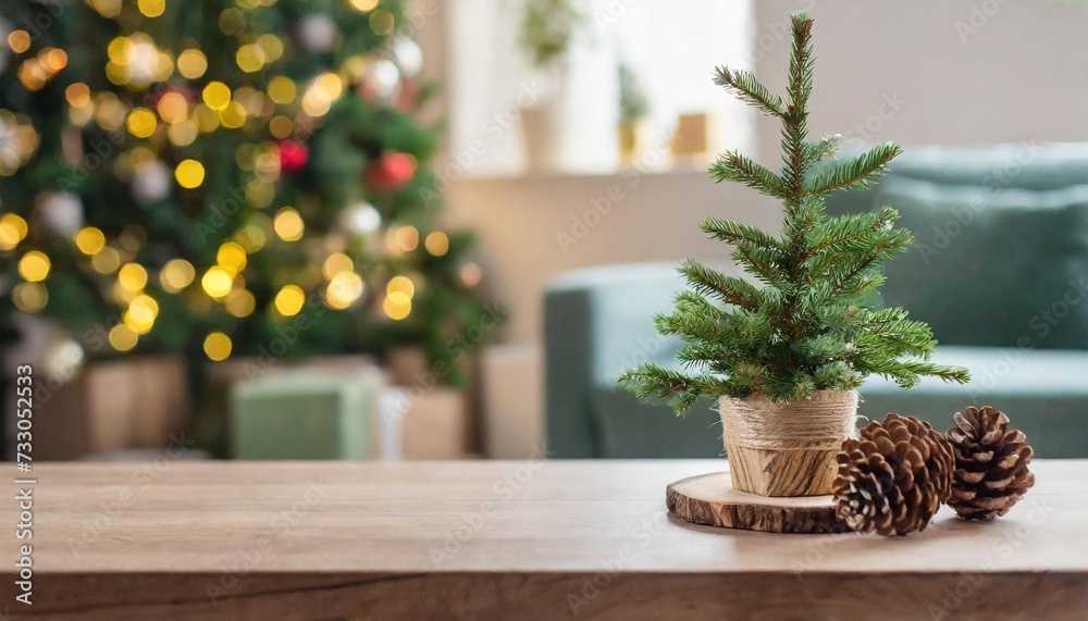 Fototapeta premium empty table top with diy christmas tree on blurred festive living room banner christmas zero waste