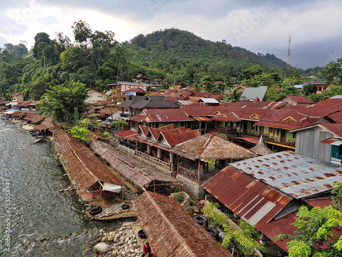 Market roofs above Lau Bohorok river, Bukit Lawang Sumatra, Indonesia photo