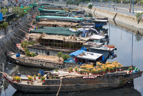 Binh Dong floating flower market before lunar new year. Boats bring flowers from the Mekong Delta to Ho Chi Minh City for Tet festival.