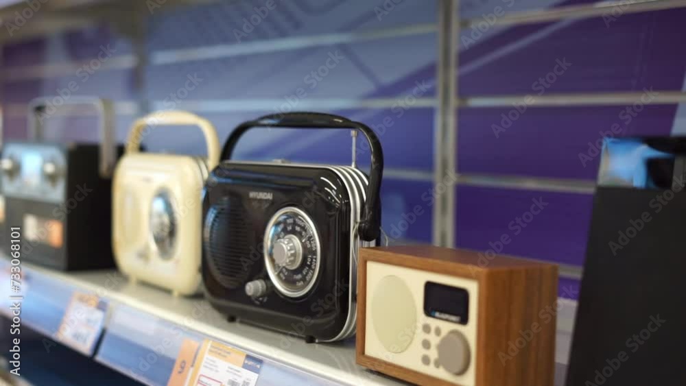 buys a radio in a store buys a radio in a store