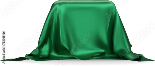 Obraz na płótnie Podium covered with a piece of green silk isolated on  background