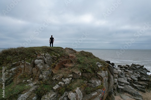 Model photo sur les rochers d une plage francaise  vue a  rienne en drone