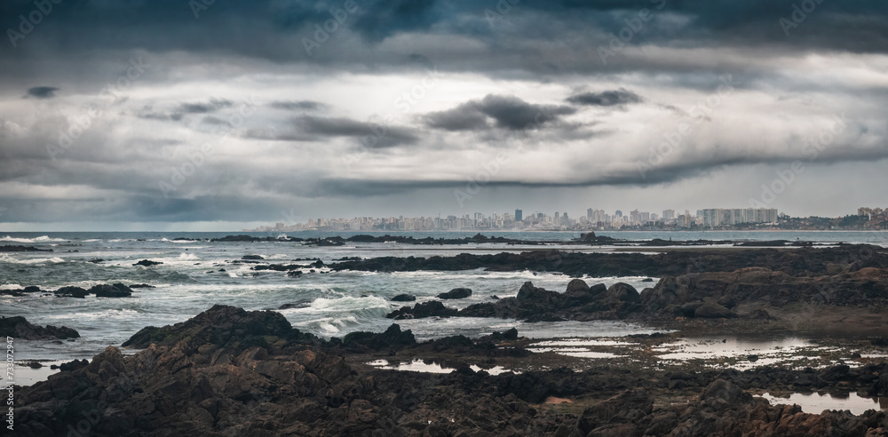 Dramatic Seascape with Rocky Foreground and SalvadorCity Skyline