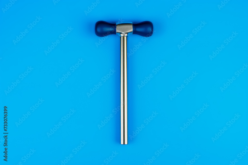 the top view of a baseball bat that is laying on a blue surface the top view of a baseball bat that is laying on a blue surface
