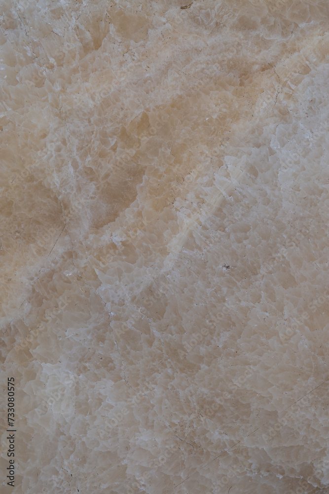 Obraz premium A close-up photo of the cream-colored stone, showing the details of the stone