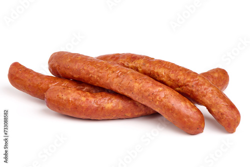 Long thin smoked sausages, isolated on white background.