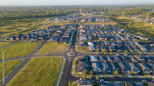 Aerial drone view of Jordan Springs East, known as the sinking suburb, in western Sydney, NSW Australia on a sunny morning in February 2024