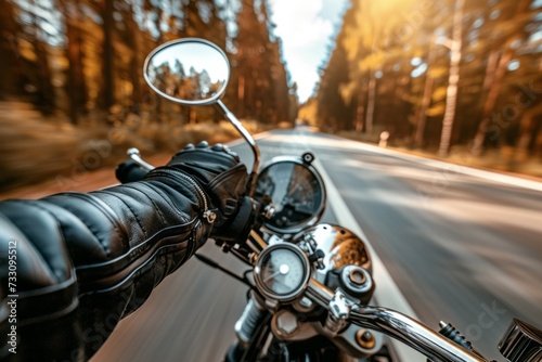 Close Up of a Motorcycle Driving Down a Road