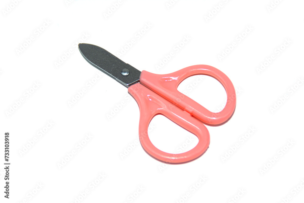 Small children's pink scissors isolated on white. Small children's pink scissors isolated on white.
