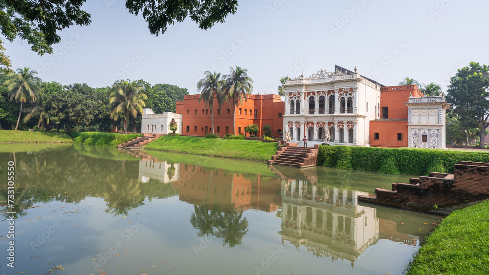 Scenic landscape view of ancient Sardar Bari with reflection in pond, Sonargaon, Bangladesh Scenic landscape view of ancient Sardar Bari with reflection in pond, Sonargaon, Bangladesh