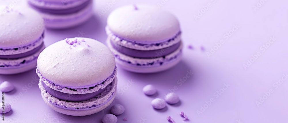 Fototapeta premium Purple macarons with decorations on purple background . Pastry food mockup.Flat lay. Minimal. Generative ai