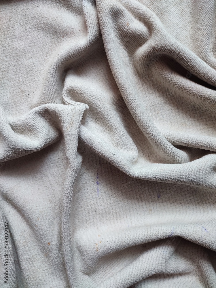 texture, pattern, background of dirty white towel exposed to sunlight texture, pattern, background of dirty white towel exposed to sunlight