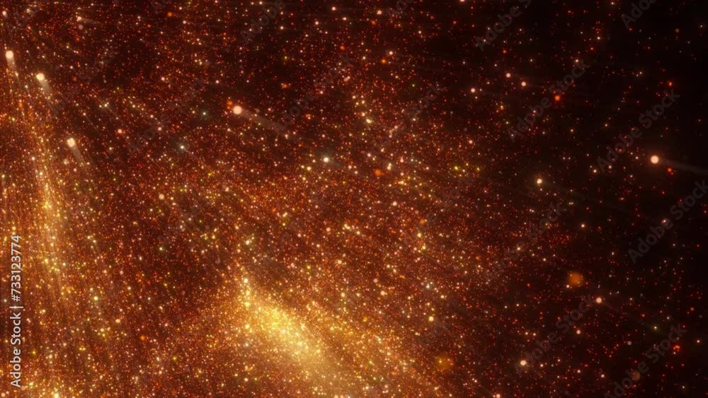 Falling golden particles on a black background