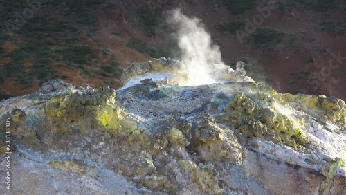 Cinematic shot of geothermal steam vents in Jigokudani Hell Valley in Noboribetsu city in Hokkaido, Japan