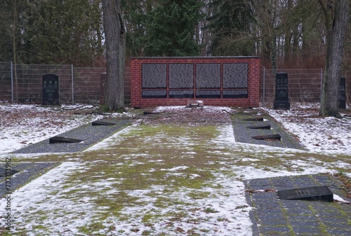 Eberswalde, Germany - Jan 13, 2024: This war cemetery contains the graves of 854 Soviet military personel and civillians who fell in 1945 during Second World War. Cloudy winter day. Selective focus
