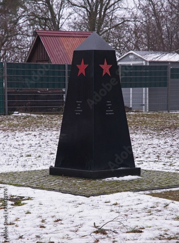 Eberswalde, Germany - Jan 13, 2024: This war cemetery contains the graves of 854 Soviet military personel and civillians who fell in 1945 during Second World War. Cloudy winter day. Selective focus