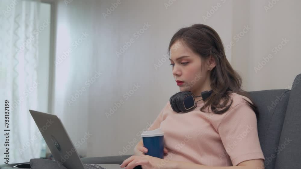 Asian woman wearing casual clothes holding a coffee cup and using the phone, shopping, searching, live streaming, social media, Asian woman wearing casual clothes holding a coffee cup and using the phone, shopping, searching, live streaming, social media,