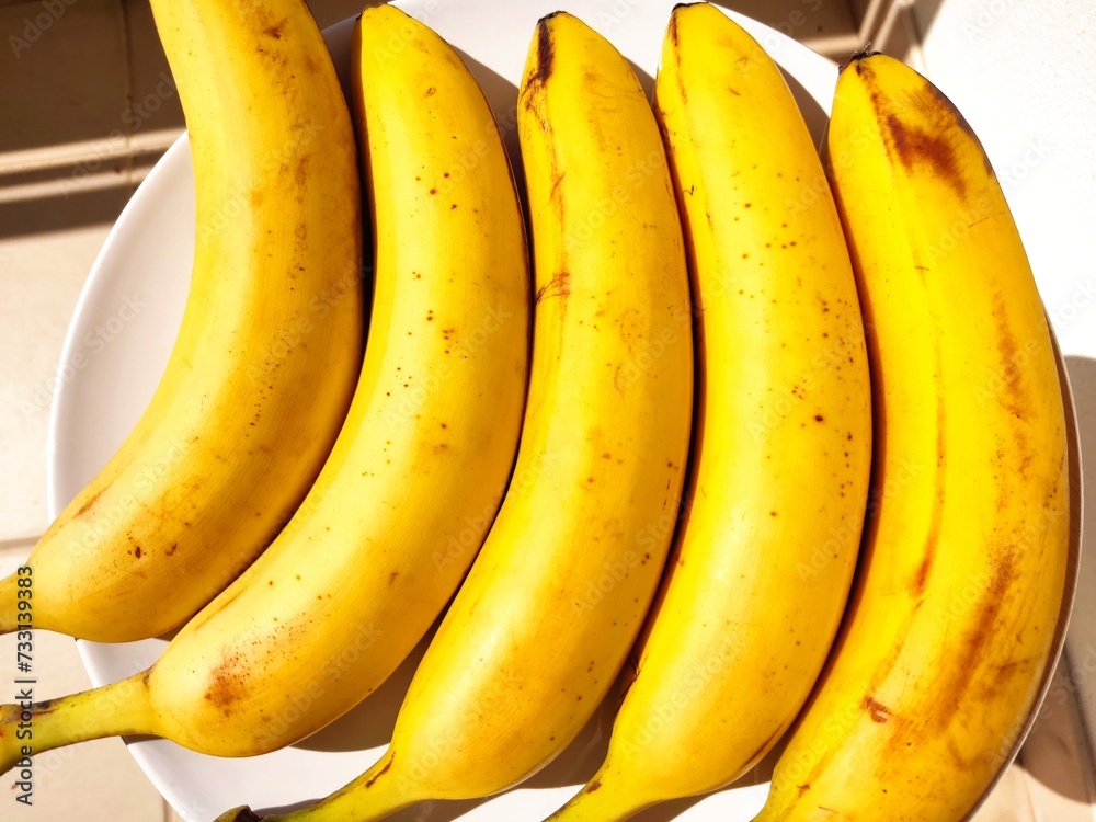 Ripe bananas. Exotic tropical yellow fruit. Banana symbol of health care and wellbeing.