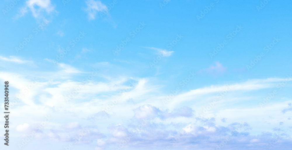 Obraz premium Blue sky with fancy clouds, panoramic photo.
