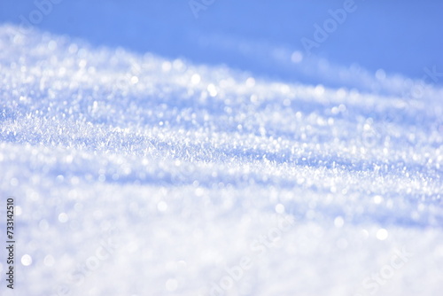 White snow closeup. Fluffy snow texture. Winter background with fresh snow 