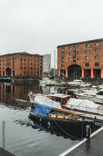 liverpool alber docks view on rainy day with modern contrast and old important buildings  photo