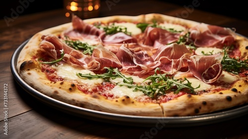 A closeup of a gourmet pizza topped with prosciutto