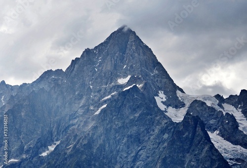 the cloudy summit of Grandes Jorasses, italian alps, Tour du Mont Blanc