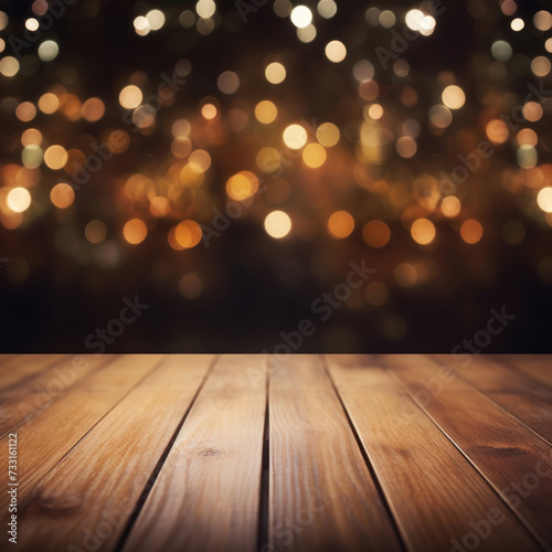Empty brown wooden floor or wood board table with blurred abstract night light bokeh background. © Wararat