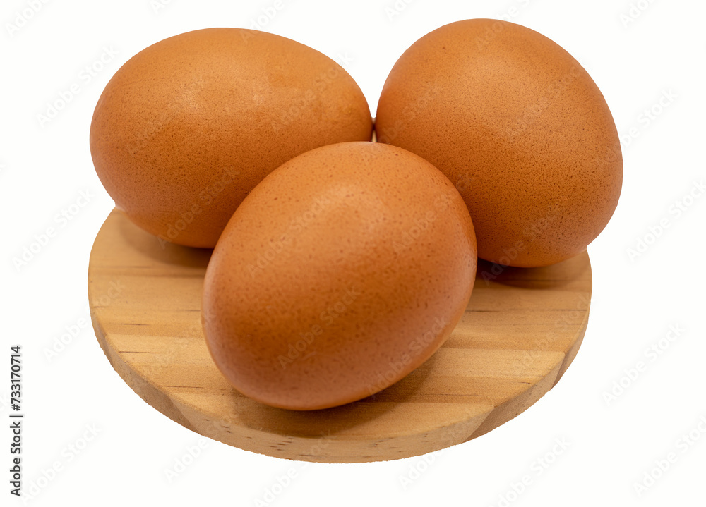 Several fresh eggs, carefully arranged on a pine wood background, ready for the Easter celebration. Their vibrant contrast with the natural wood creates a rustic and warm image, perfect for bringing a Several fresh eggs, carefully arranged on a pine wood background, ready for the Easter celebration. Their vibrant contrast with the natural wood creates a rustic and warm image, perfect for bringing a