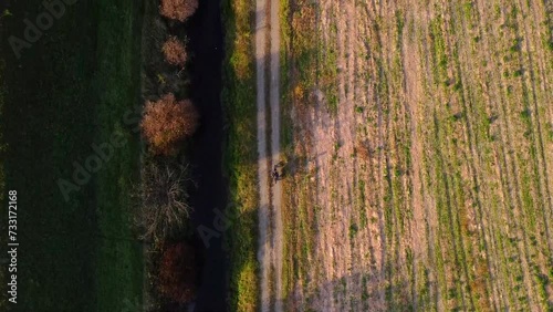 moped in the golden hour on a gravel path