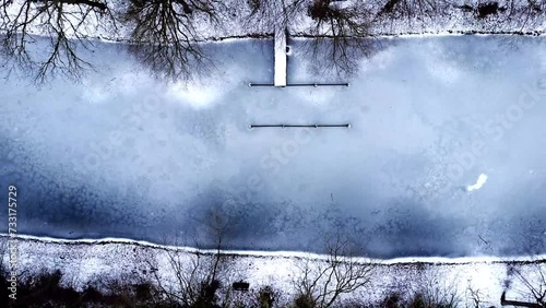 Frozen lake in the forest
