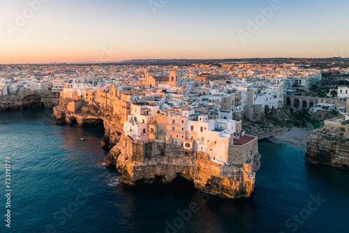 The city of Polignano a Mare during sunrise. Aerial view. Puglia, Italy.