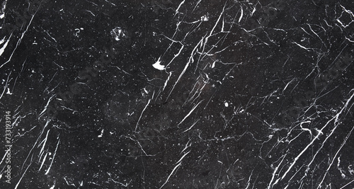 Texture of a black marble surface photo