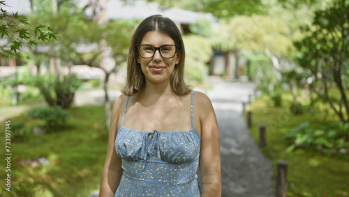 Beautiful hispanic woman in glasses, joyful portrait of her smiling, laughing and posing confident in japan's traditional kyoto park, emotion painted on her carefree face surrounded by nature Free Download Beautiful hispanic woman in glasses, joyful portrait of her smiling, laughing and posing confident in japan's traditional kyoto park, emotion painted on her carefree face surrounded by nature - GFXLoad
