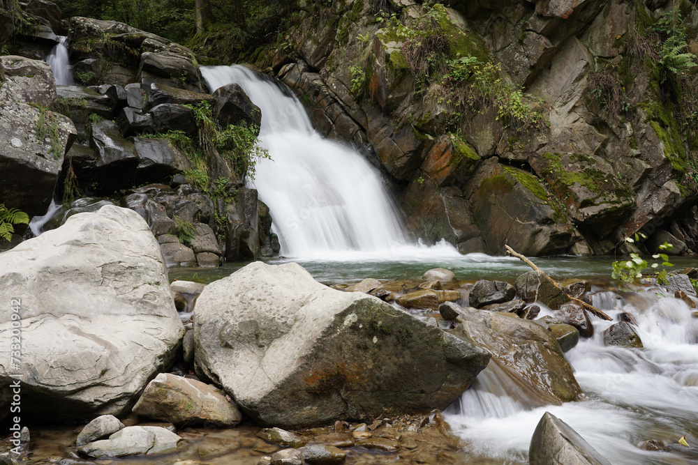 Fototapeta premium September in the Pieniny Mountains, cascade on a mountain rive