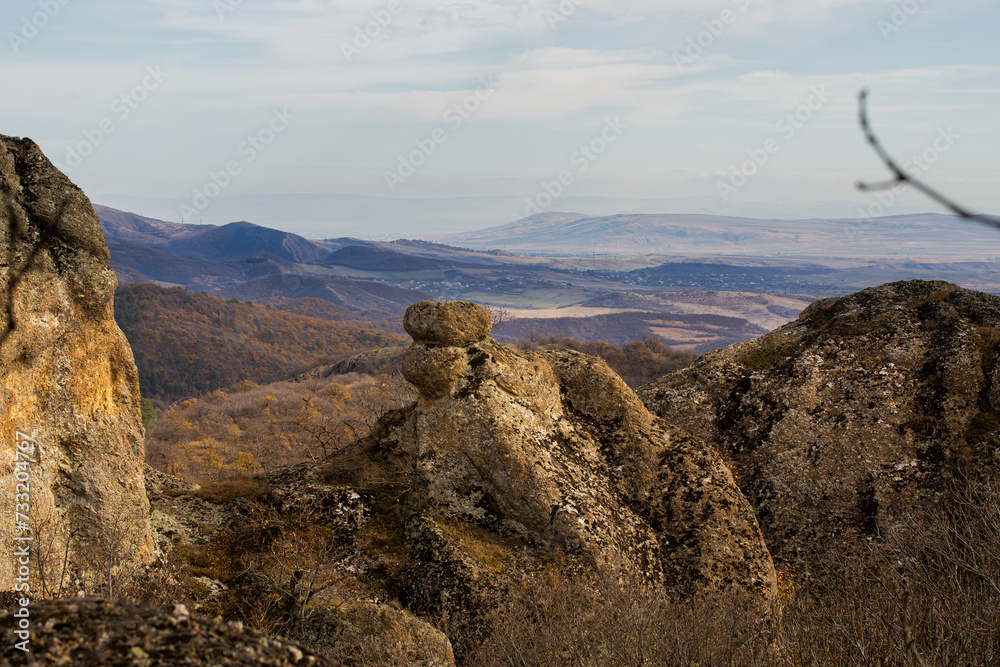 Naklejka premium Landscape of mountains in Birtvisi, Georgia. Amazing view of the Caucasus land. Landscape of a mountainous area with rocks and cliffs on an autumn day. Autumn landscape of Birtvisi canyon, Kvemo Kartl