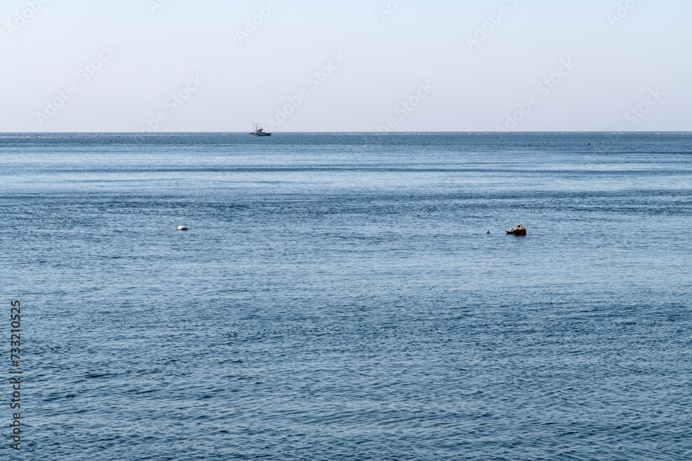 fishing boat in the blue sea
