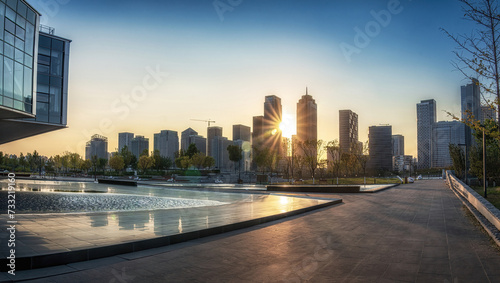 Panoramic Sunset View of a Modern Cityscape and Urban Park © evening_tao