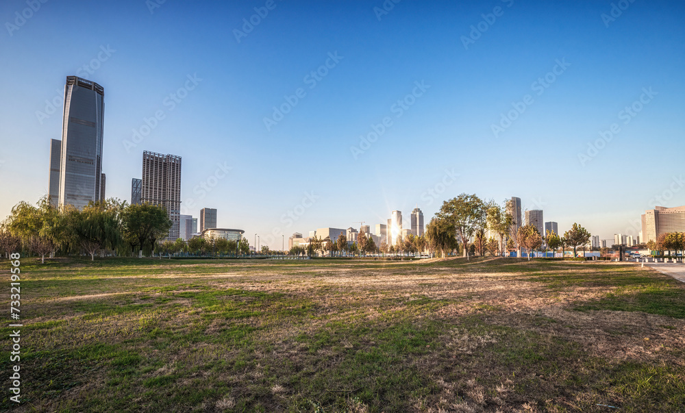 Urban Greenery and Skyline under Clear Blue Sky Urban Greenery and Skyline under Clear Blue Sky