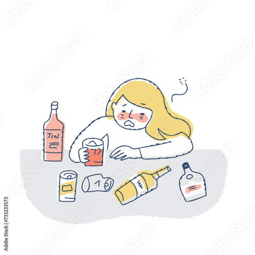 お酒を飲んで泥酔している女性